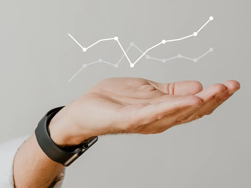 desempenho-de-grafico-digital-com-sobreposicao-de-mao-de-empresario
